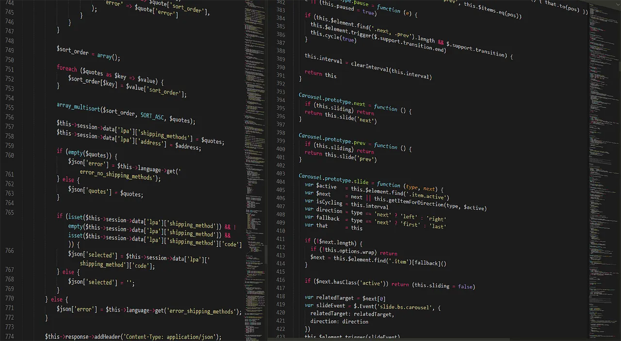 A person working with code on a laptop
