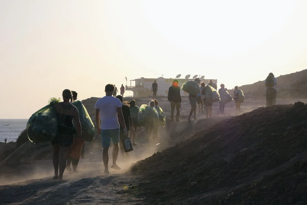 Volunteers cleaning a beach