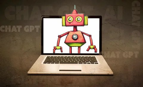 Osoba korzystająca z laptopa i asystenta AI