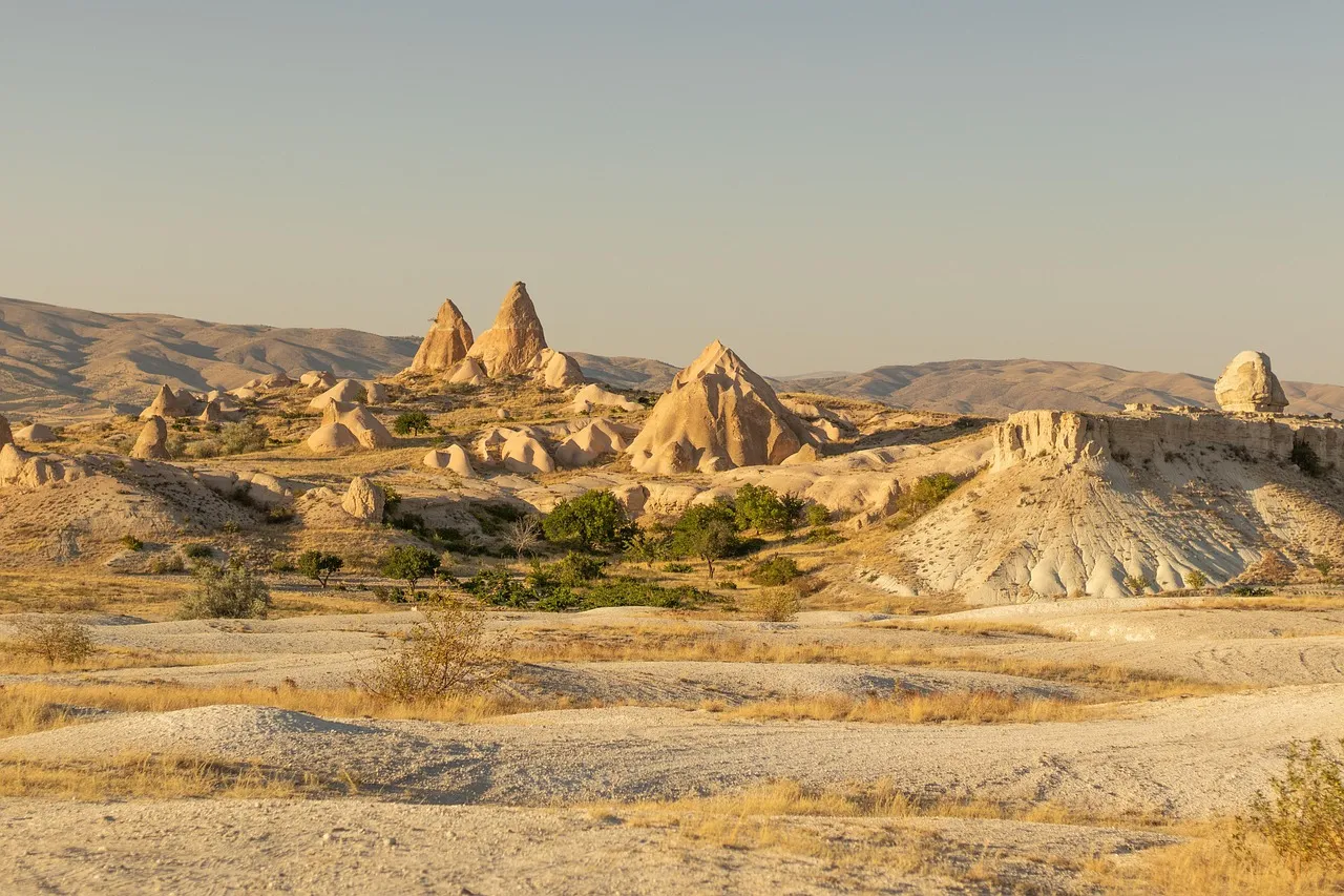 Tourists in a valley among rocks in Cappadocia
