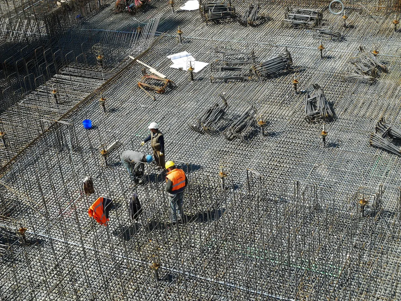 Workers in hard hats on a construction site